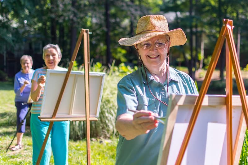 Ladies Painting by Pond